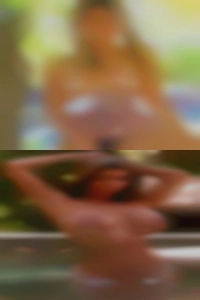 Girl in Elgin swingers club nude.